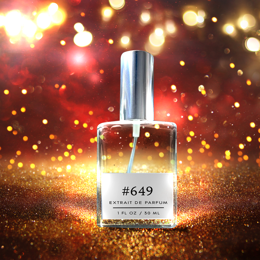 A 1 fl/30 ml bottle stands on a red shimmery gold surface, illuminated by elegant lighting. The label reads '649 Baccarat Rouge 540 Inspired Fragrance Dupe - Jasmine, Saffron, Amber, Cedar', evoking the essence of luxury and sophistication.